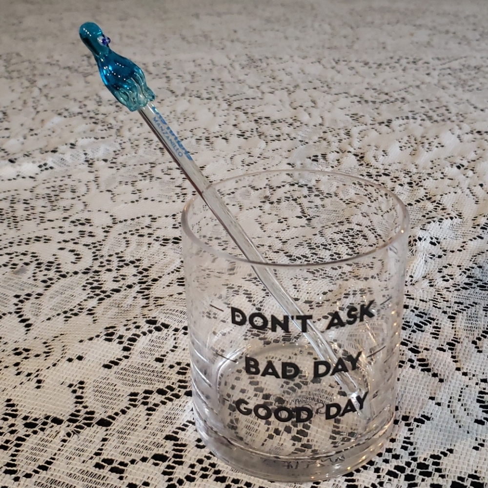 Drinking Glass with Stirrer that has measurements.